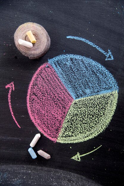 High angle view of colorful chalks on slate