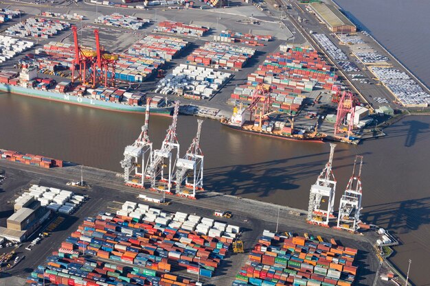 High angle view of cranes at harbor