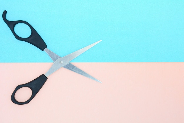 Photo high angle view of cross on table against blue background