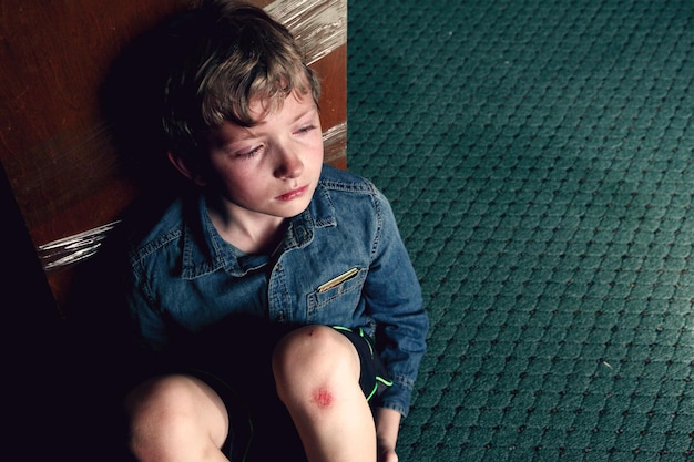 high angle view of crying boy