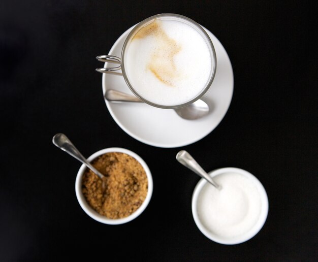 High angle view of a cup of coffee with sugar