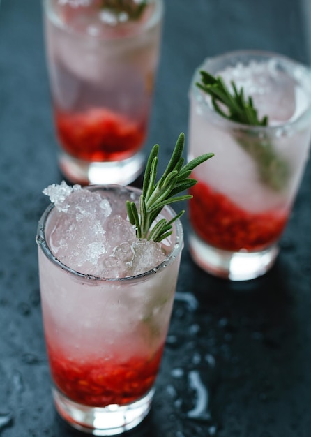 high angle view of drinks in glass on wet table