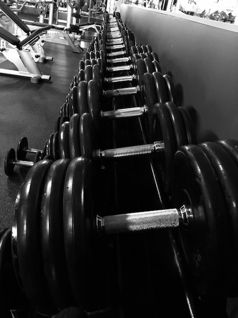 High angle view of dumbbells in gym