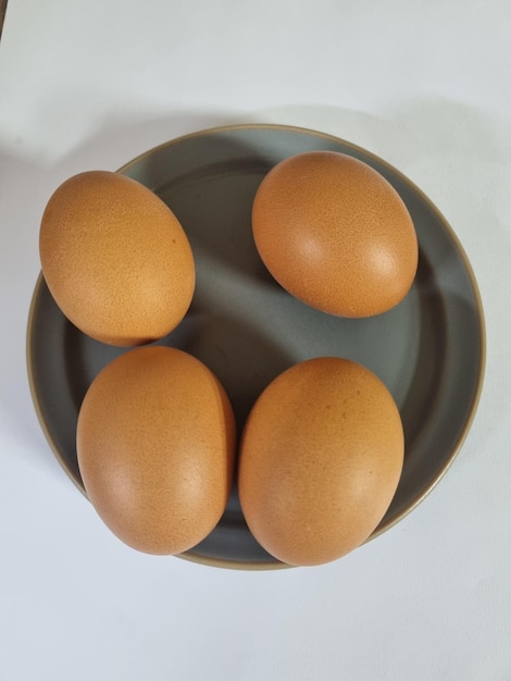 High angle view of egg on white background