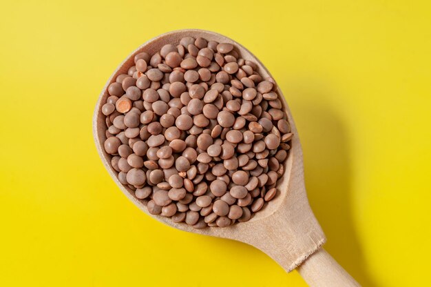 High angle view of eggs against yellow background