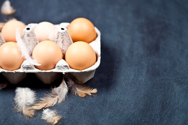 High angle view of eggs in container on table