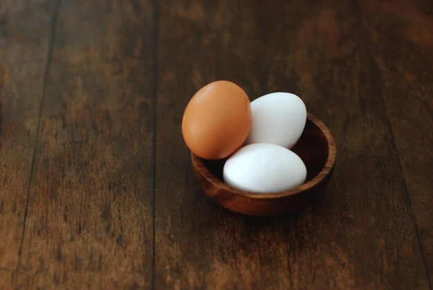 High angle view of eggs in container on table