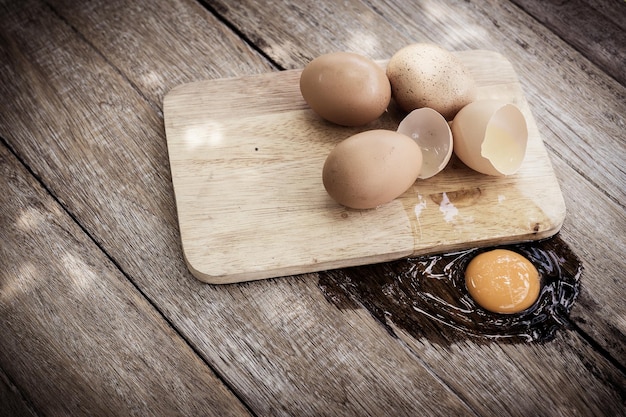 High angle view of eggs on cutting board