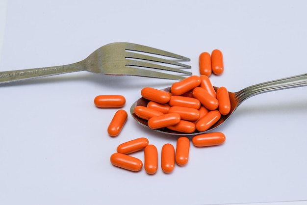 High angle view of eggs in plate against white background