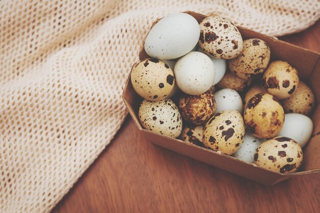 High angle view of eggs on table easter eggs quail eggs