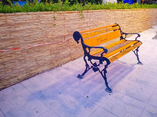 High angle view of empty bench in park