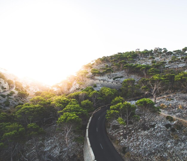 Photo high angle view of empty winding road with copy space