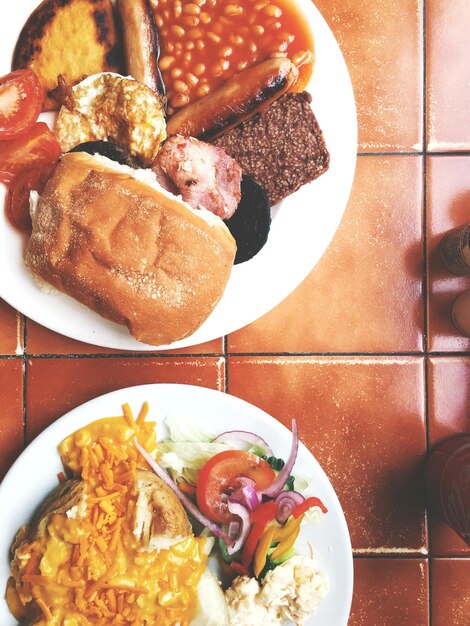 Photo high angle view of english breakfast served on table