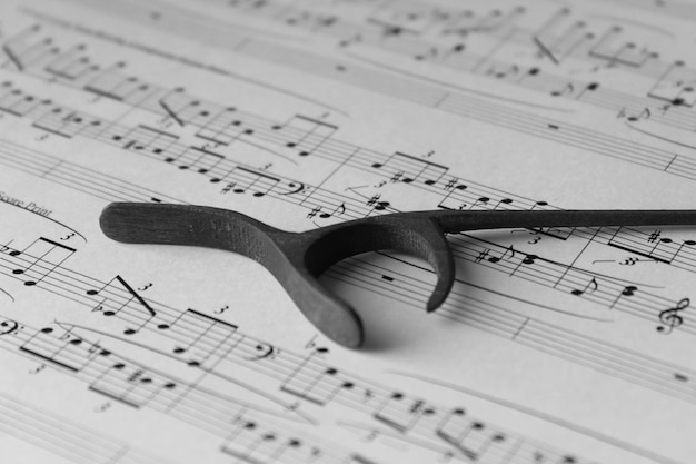 High angle view of equipment on sheet music