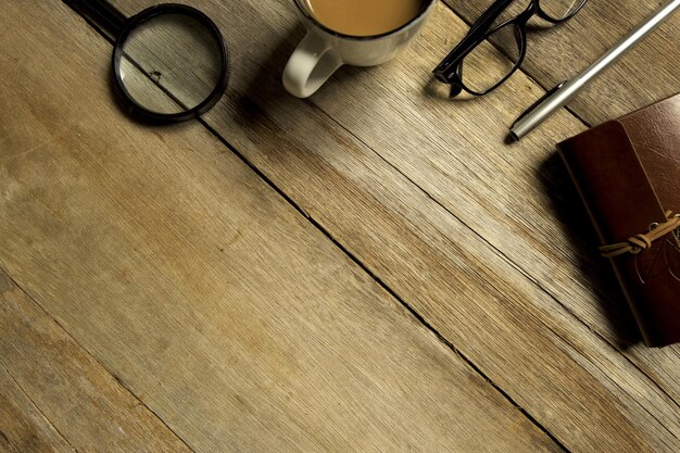 Photo high angle view of eyeglasses and book on table