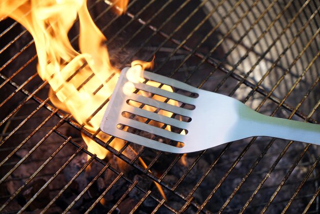 Photo high angle view of fire on barbecue grill