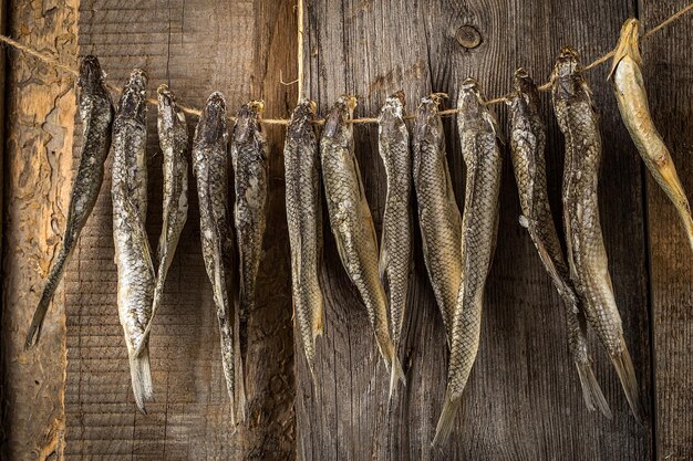 High angle view of fish hanging at market