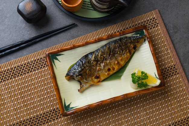 High angle view of fish in plate on table