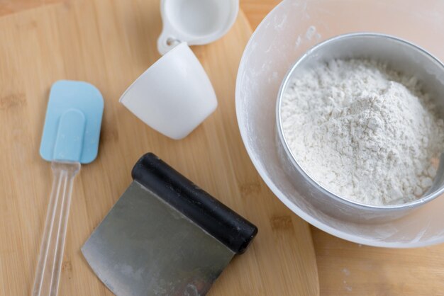 High angle view of flour in bowl on table