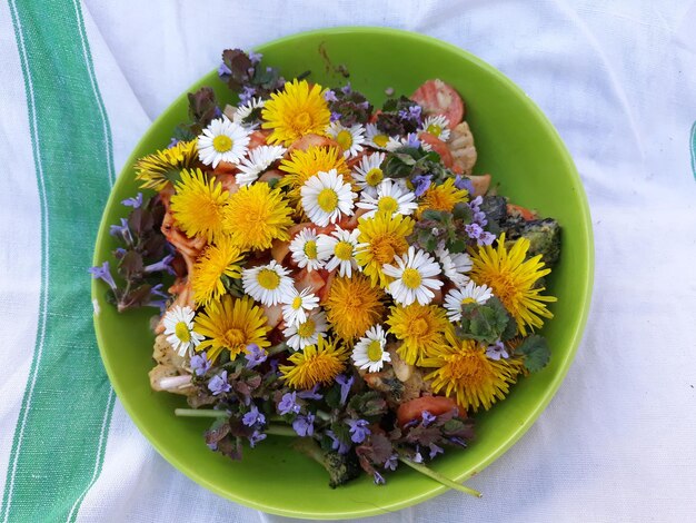 High angle view of flowers in bowl on table