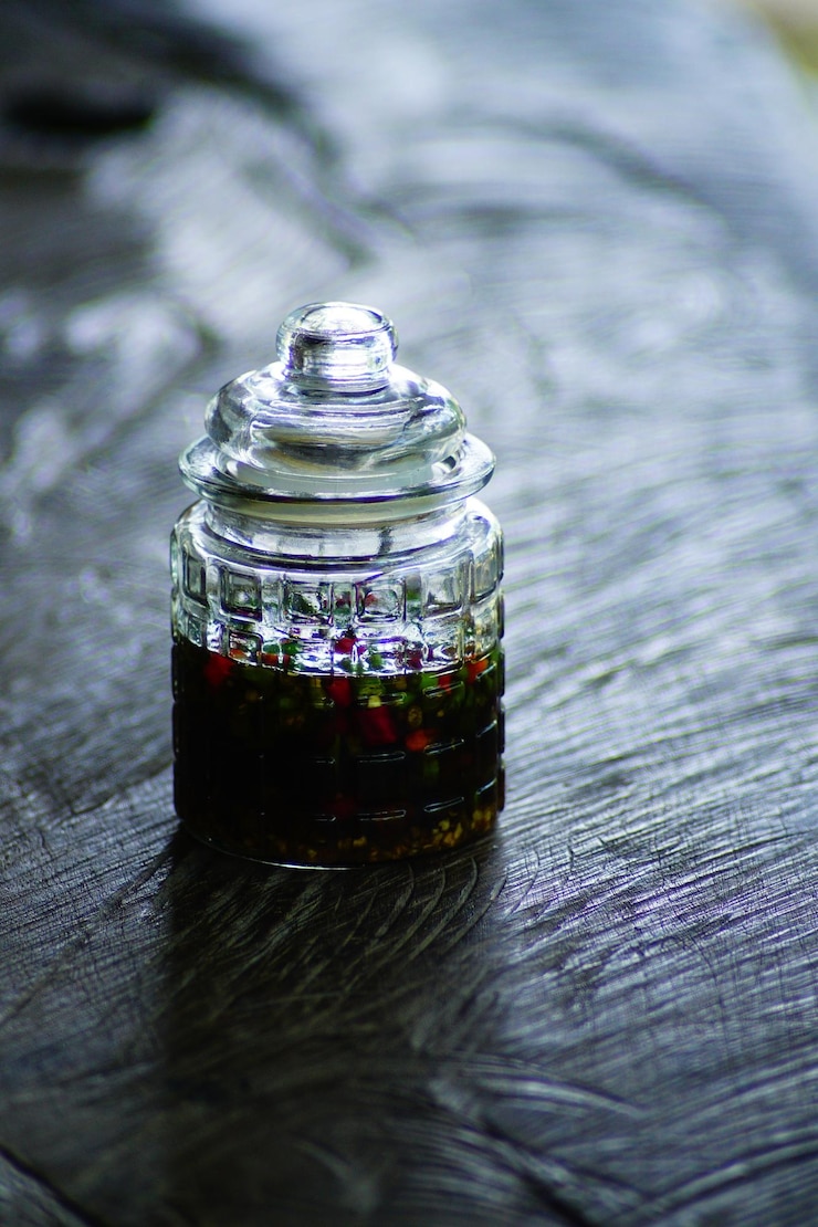 Photo high angle view of food in glass jar on table