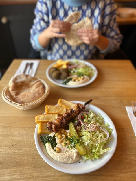 High angle view of food in plate on table at lunch in daylight