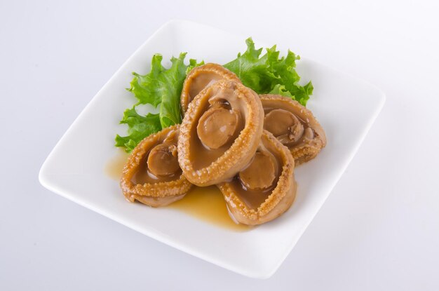 High angle view of food in plate over white background