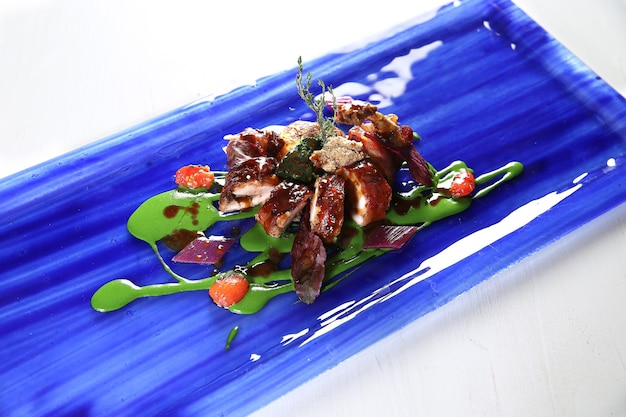 High angle view of food served in blue plate on table