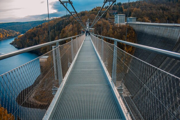 High angle view of footbridge against sky