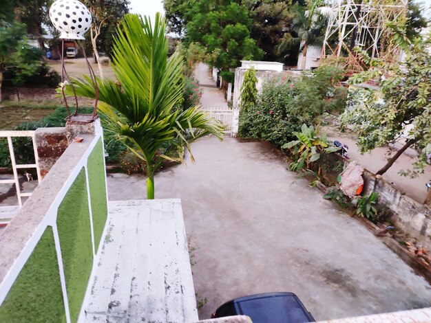 High angle view of footpath amidst buildings in city