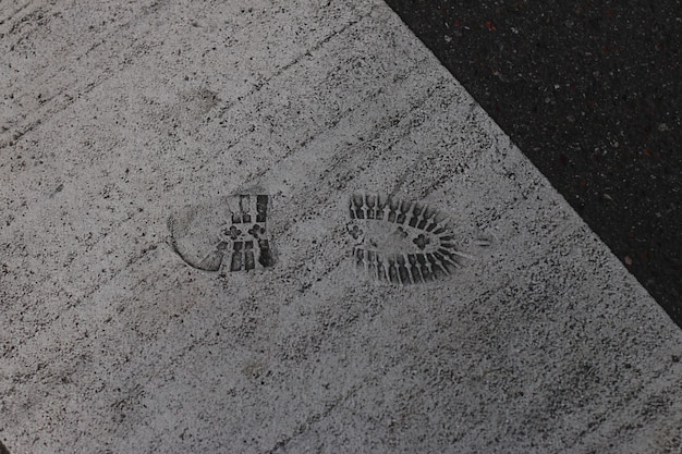 High angle view of footprint on street