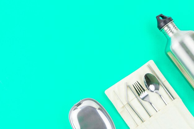 High angle view of fork on table against blue background