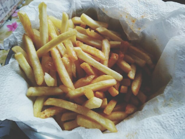 High angle view of french fries in container