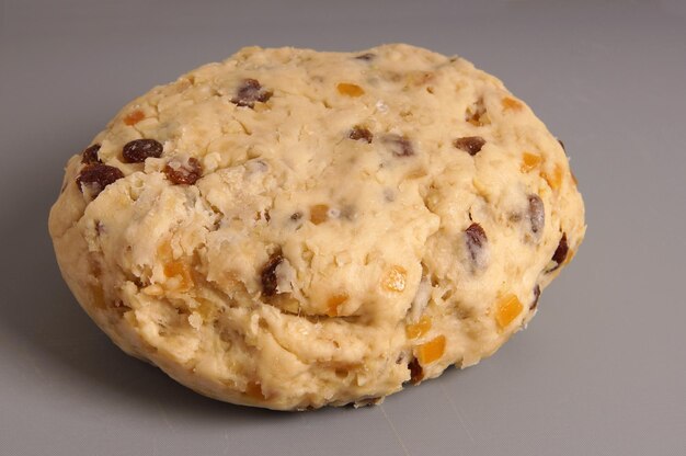 High angle view of fresh stollen against gray background