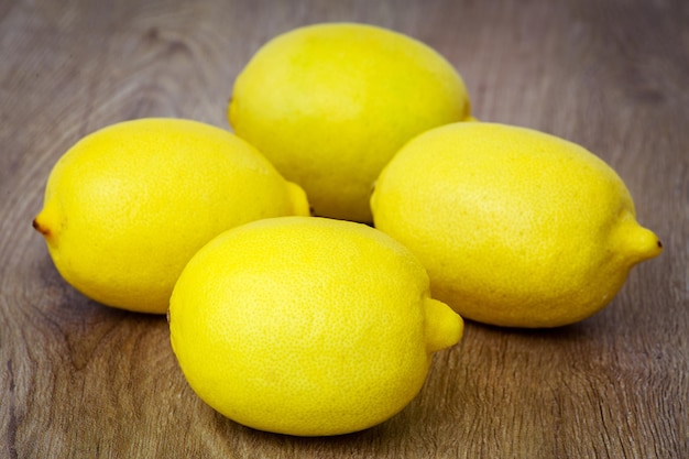 High angle view of fresh yellow lemons on table