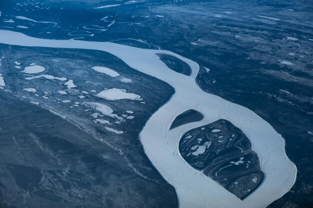 Photo high angle view of frozen water on land