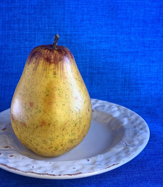 High angle view of fruit in plate on table