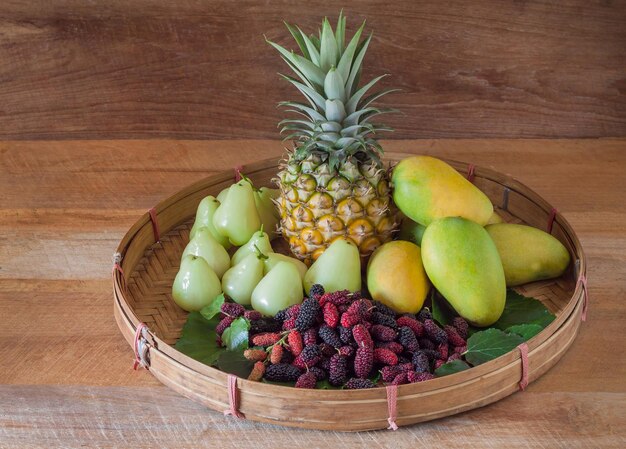 High angle view of fruits in basket on table