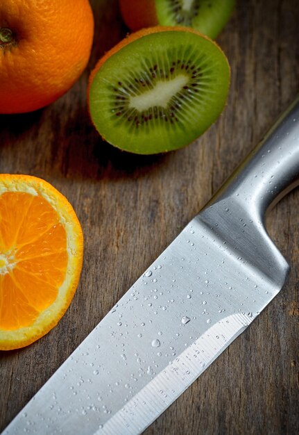 High angle view of fruits on cutting board