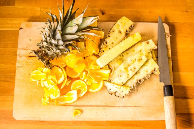 High angle view of fruits on cutting board