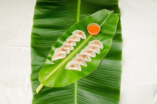 High angle view of fruits leaves on table