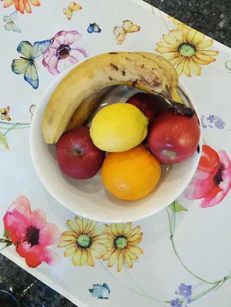 High angle view of fruits in plate on table