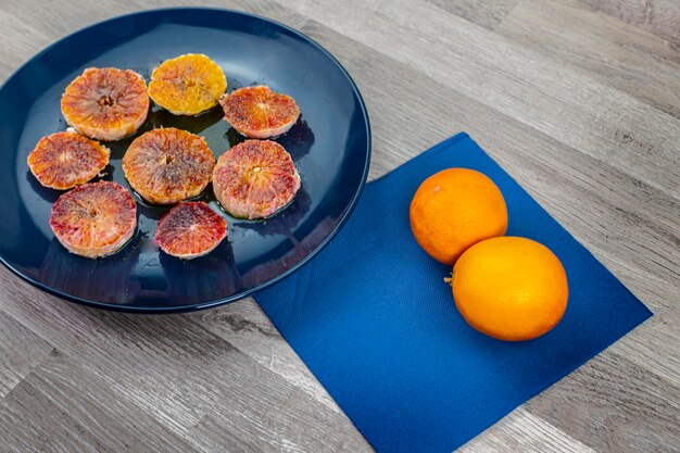 High angle view of fruits in plate on table