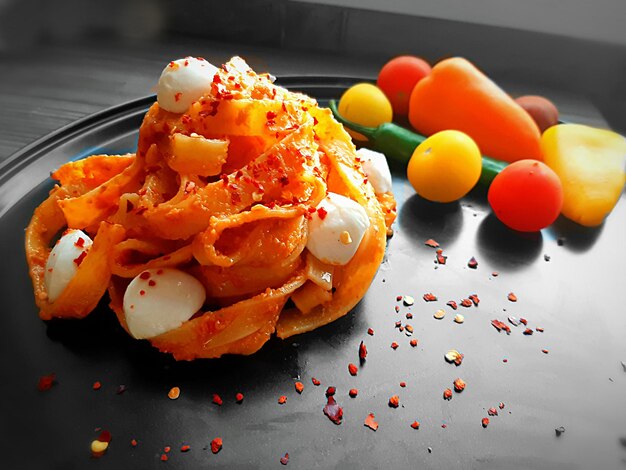 High angle view of fruits in plate on table