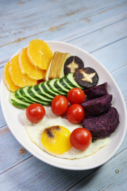 High angle view of fruits in plate on table