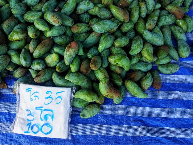 Photo high angle view of fruits for sale in market