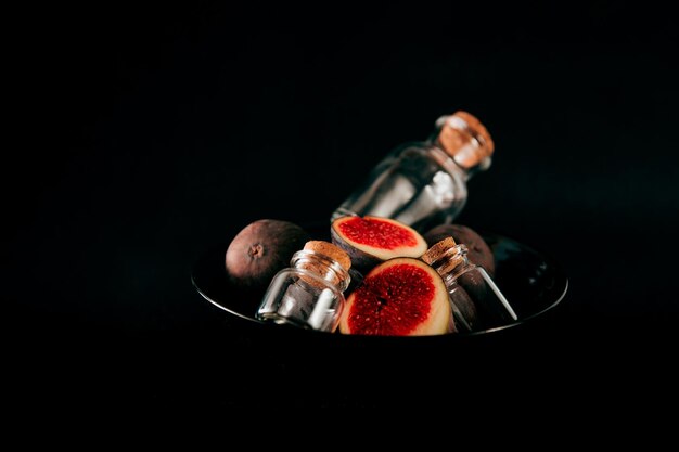 Photo high angle view of fruits on table against black background