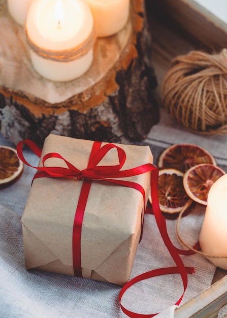 High angle view of gift box with candles on table