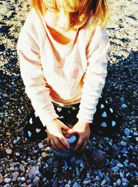 Photo high angle view of girl on beach