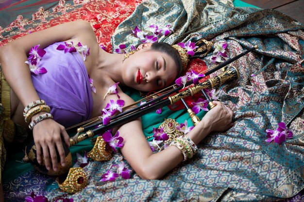 Photo high angle view of girl playing on bed